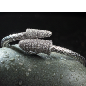 The Serpentine Luxe Collection: Diamond-Encrusted Serpent Bangle